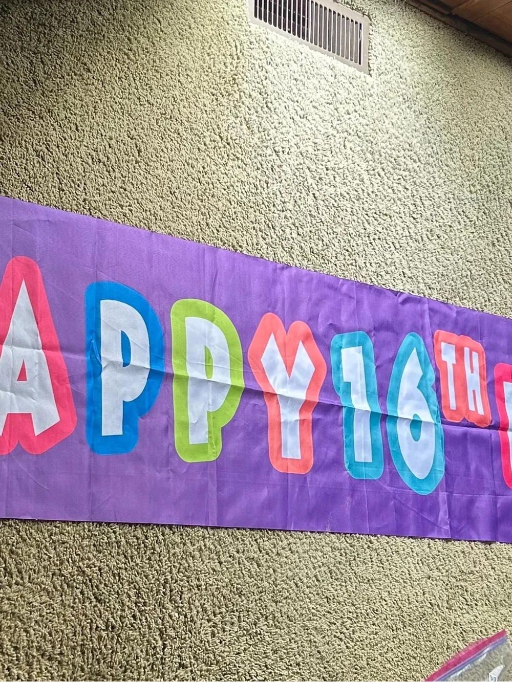Purple 'Happy 16th' Party Banner with Multicolor Letters